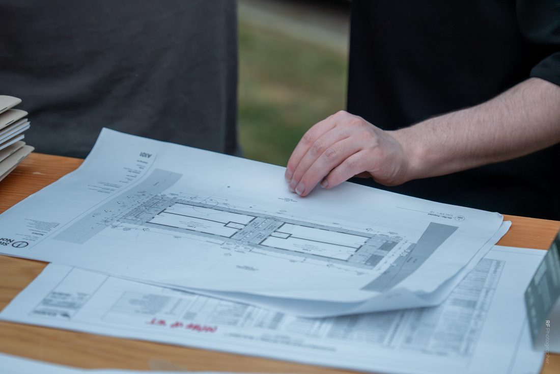 Project drawings laid out on a table.